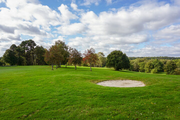 Fototapeta na wymiar view over part of 18 hole parkland golf course. outdoor leisure and recreation 