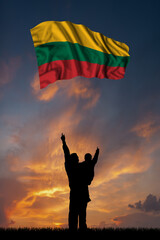 Father with son and the flag of Lithuania