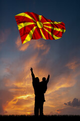 Father with son and the flag of Macedonia