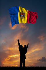 Father with son and the flag of Moldova
