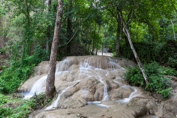 Beautiful Bua Tong Sticky Waterfalls in Chiang Mai province in Northern Thailand. River stream in a...