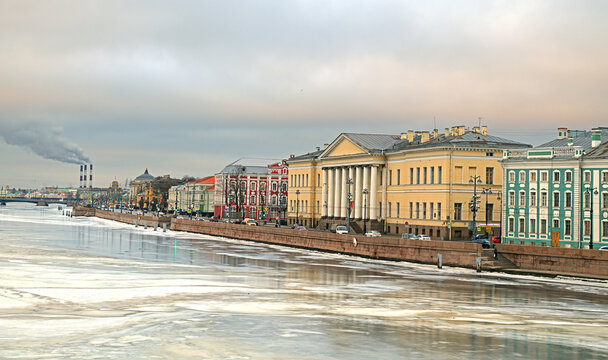 Winter landscape. Frozen river Neva, University embankment and Petersburg Academy of Sciences in winter morning in St. Petersburg
