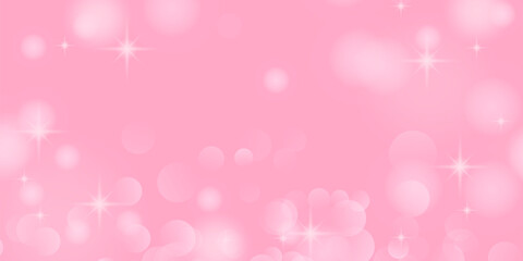 春をイメージしたキラキラ背景。キレイなピンク色の背景イラスト。玉ボケ。パーティクル。