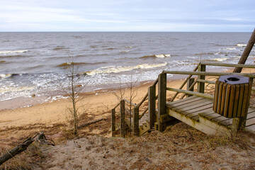 Steep shore of the Baltic Sea and wooden stairs, Latvia.