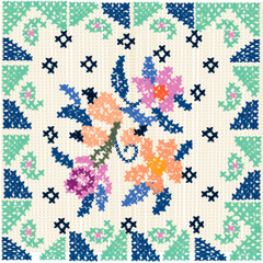 Embroided cross stitch paisley flower