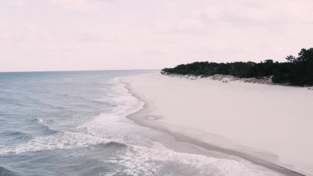 AERIAL with sandy beach of Baltic Sea in Poland.