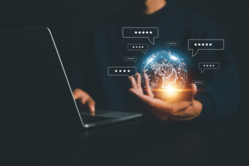 Chatbot chat AI concept, artificial intelligence Businessman using AI smart robot technology inputting commands to analyze data and build something. future technology changes.
