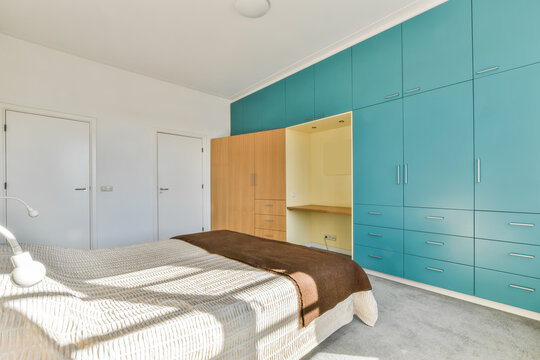 Modern bedroom with built in wall unit