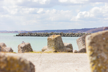 Big shaped stones near sea beach, close-up selective focus