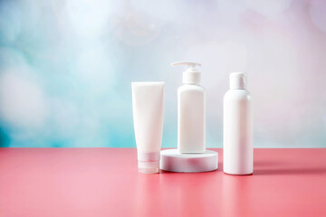set of bottles for cosmetics on a purple-blue background