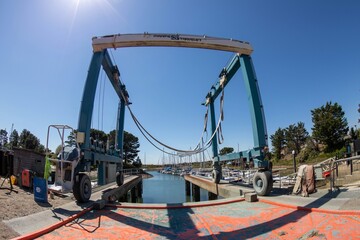 boat hoist on wheels in the marina taken with a fish eye lens
