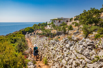 Gagliano del Capo, Salento. Some people follow the naturalistic path that from the Ciolo bridge...