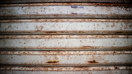 rusted iron striped garage door