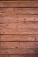 Fototapeta na wymiar ココア色の木の壁背景素材