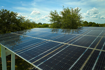 Solar panels installed over parking lot for parked cars for effective generation of clean energy
