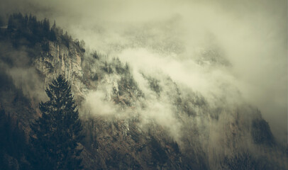 Rocky Mountain Covered with Clouds Landscape