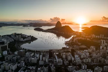 Zelfklevend Fotobehang Golden Sunrise over Guanabara Bay in Rio de Janeiro with Sugarloaf Mountain in the Horizon © Donatas Dabravolskas