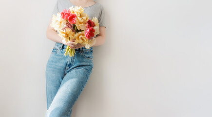 Woman holding tulip bouquet, spring lifestyle aesthetic, with copy space
