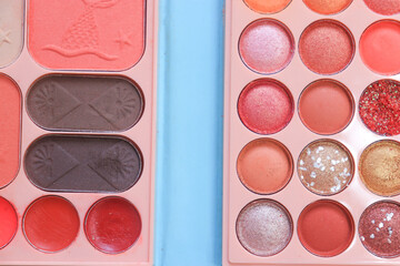 Cosmetic makeup products on white background