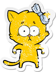 distressed sticker of a cartoon cat