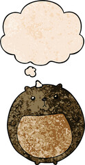 cartoon bear and thought bubble in grunge texture pattern style
