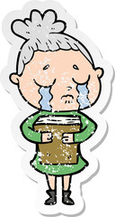 distressed sticker of a cartoon crying woman holding book