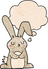 cartoon rabbit and thought bubble in grunge texture pattern style