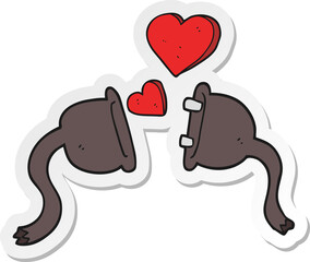 sticker of a cartoon electrical plugs
