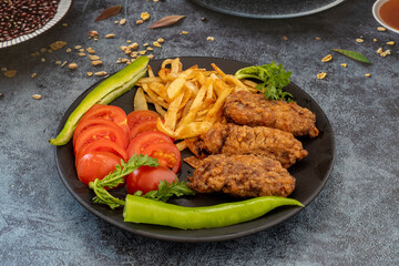Turkish style meatballs. Turkish cuisine delicacies. Meatballs fried in breadcrumbs. local name Kadin Budu Kofte or Women's Leg Meatballs. 