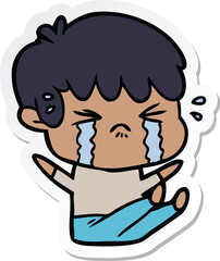 sticker of a cartoon boy crying