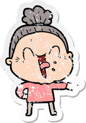 distressed sticker of a cartoon happy old woman