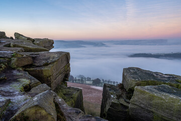 Bamford Edge sunrise cloud inversion in the Peak District National Park, UK.