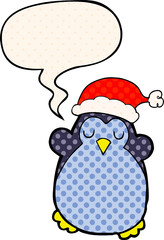 cute christmas penguin and speech bubble in comic book style