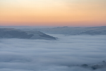 Fototapeta na wymiar Bamford Edge sunrise cloud inversion in the Peak District National Park, UK.