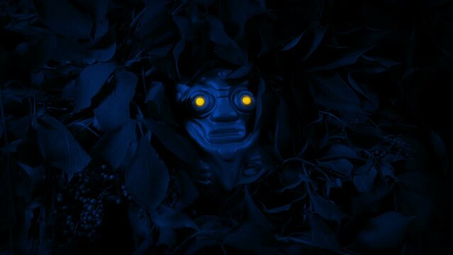 Glowing Eyes On Statue In The Forest