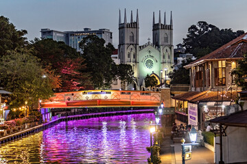 St. Francis Xavier Church and Melaka river by night in Malacca, Malaysia