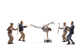 African american guy performing handstand with a boombox and group of older men dancing around