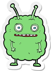 sticker of a cartoon funny alien monster