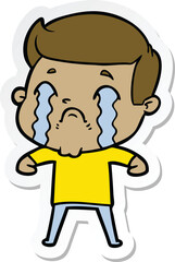 sticker of a cartoon man crying