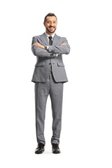 Young cheerful businessman posing with crossed arms