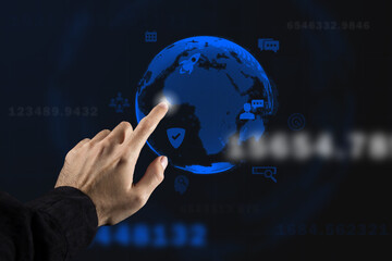 Hand touches the projection of the planet. Concept of globality of customer network structure, data exchange connections, digital marketing, communication network and internet business.