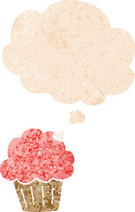 cartoon  muffin and thought bubble in retro textured style