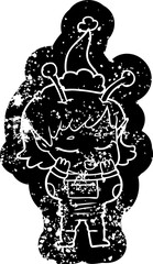 cartoon distressed icon of a alien girl wearing santa hat