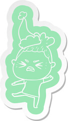 cartoon  sticker of a angry woman wearing santa hat