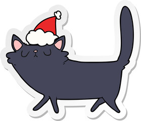 sticker cartoon of a black cat wearing santa hat
