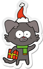 nervous dog sticker cartoon of a with gift wearing santa hat