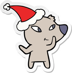 cute sticker cartoon of a bear wearing santa hat