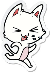 sticker of a cartoon cat hissing