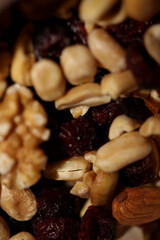 Mix of dried cranberries fruits almonds and nuts in a bowl close up modern background high quality big size stock photos prints