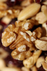 Mix of dried cranberries fruits almonds and nuts in a bowl close up modern background high quality big size stock photos prints